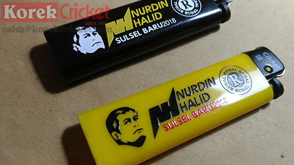 Korek Cricket warna hitam dan kuning sablon logo Nurdin Halid Sulawesi Selatan