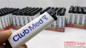 Korek gas Api Cricket warna Putih sablon biru logo Club Med Boutique Bali